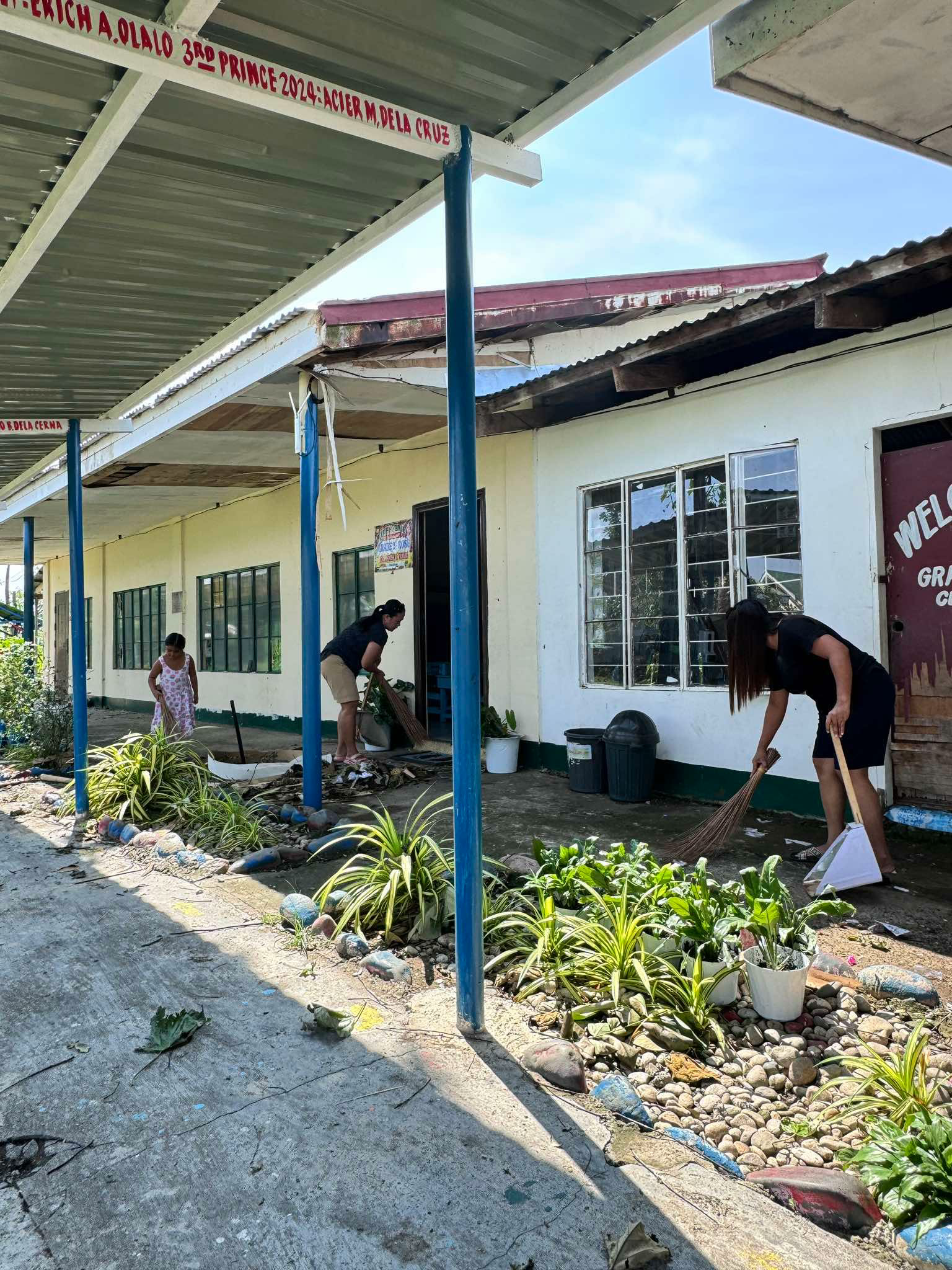 Staff cleaning at Macatal Elementary School