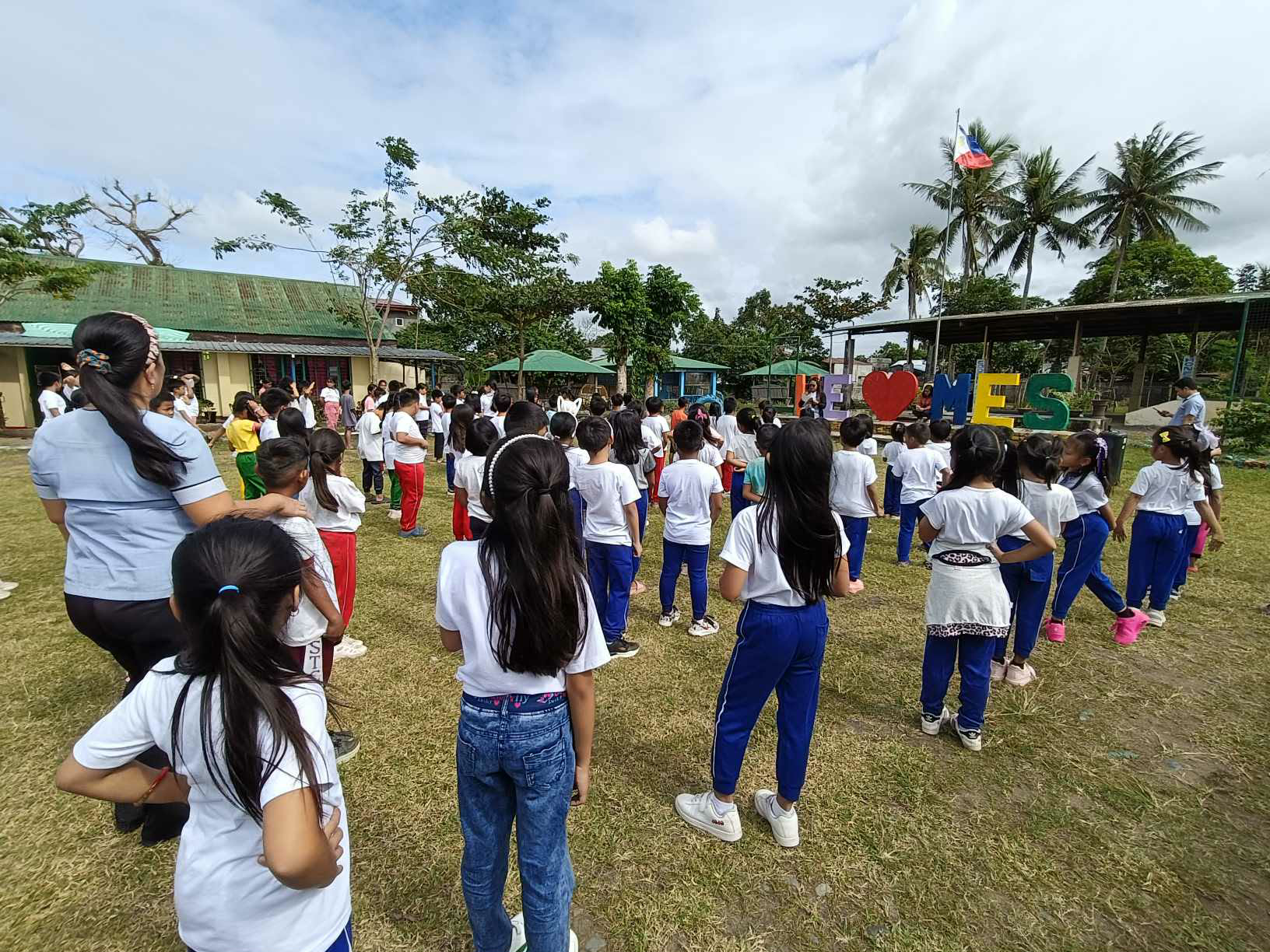 Students gathered outside at Macatal Elementary School